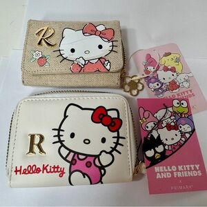 NWT. Primark Hello Kitty 2 wallets (NOTE ISSUES)